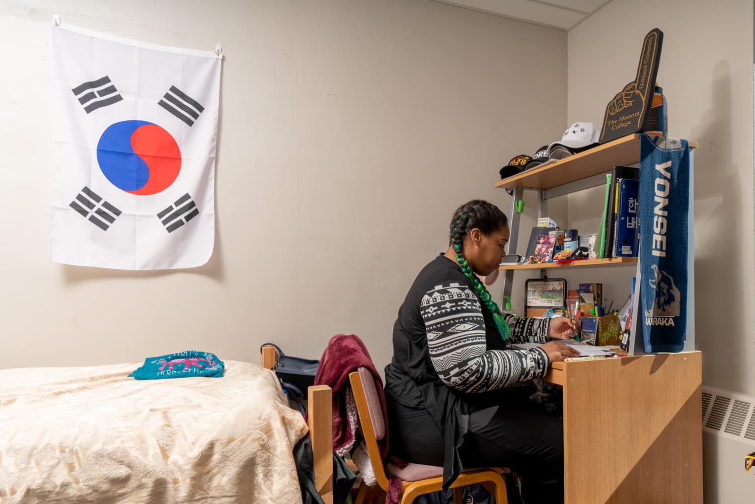  student studying at desk in dorm 