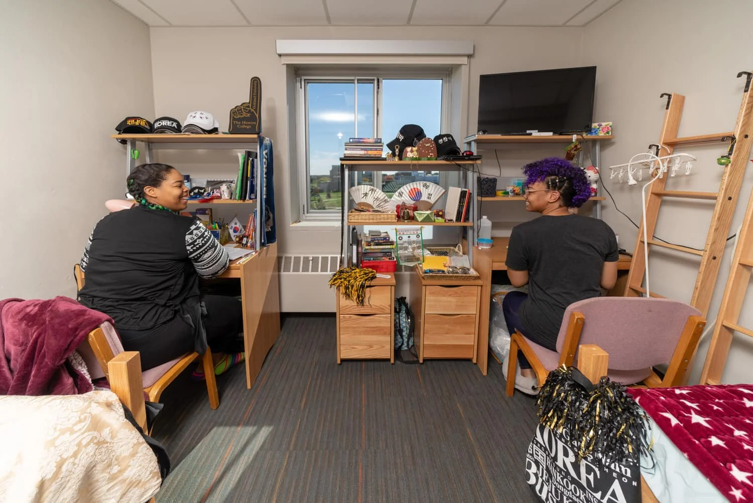 Sisters in college dormatory