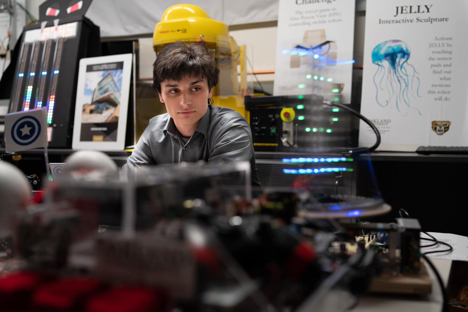  student watching spinning LED 