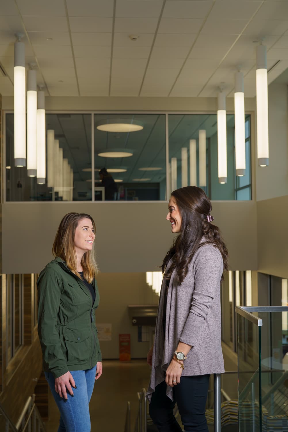  student and advisor having a conversation in Hillcrest Hall 