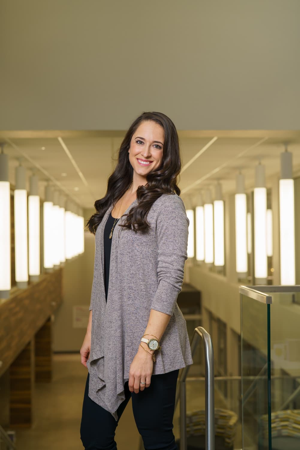  Advisor portrait in front of row of lights 