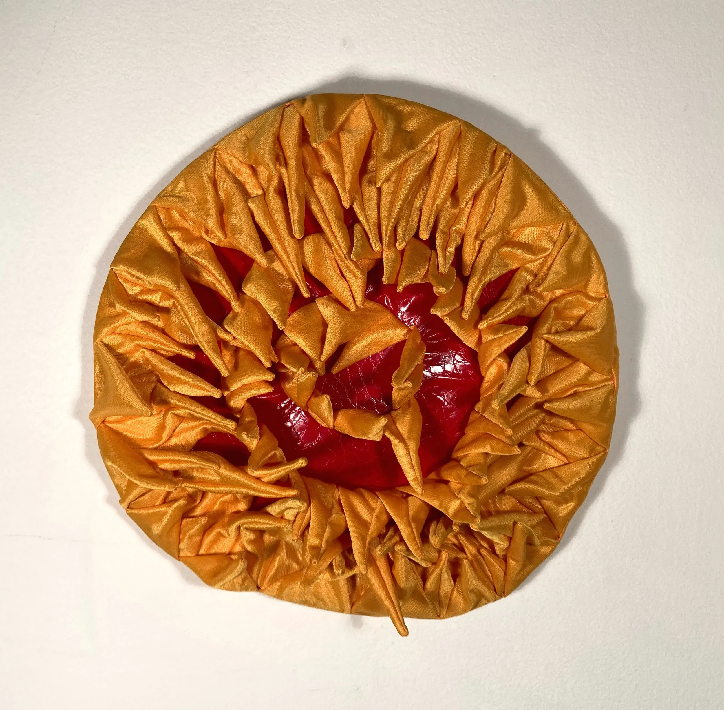   Sunflower Head     Polyester, pleather, wood    11”x11”   2022   