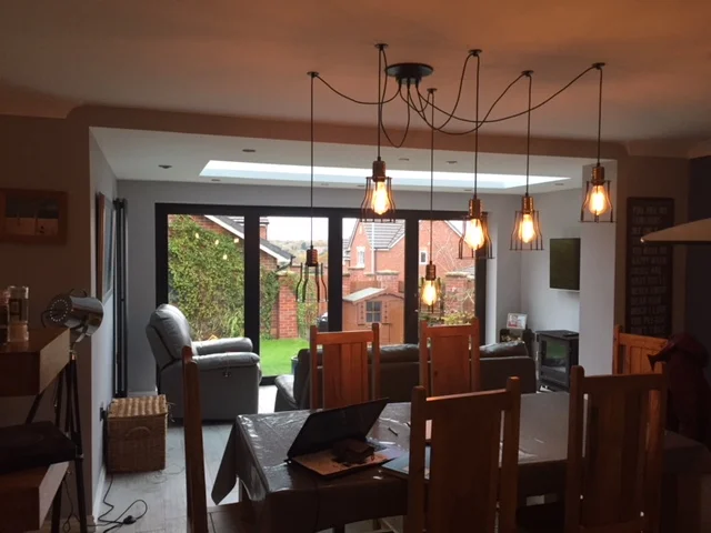 The extension creates an open, flexible living space.