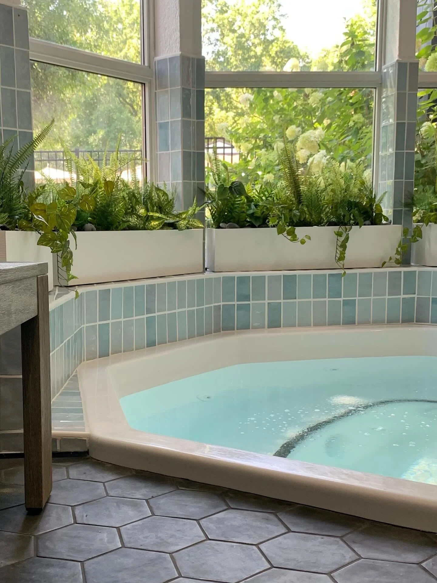 SERENITY FOUND 
Where an old hot tub once sat, now mindfulness and relaxation awaits.