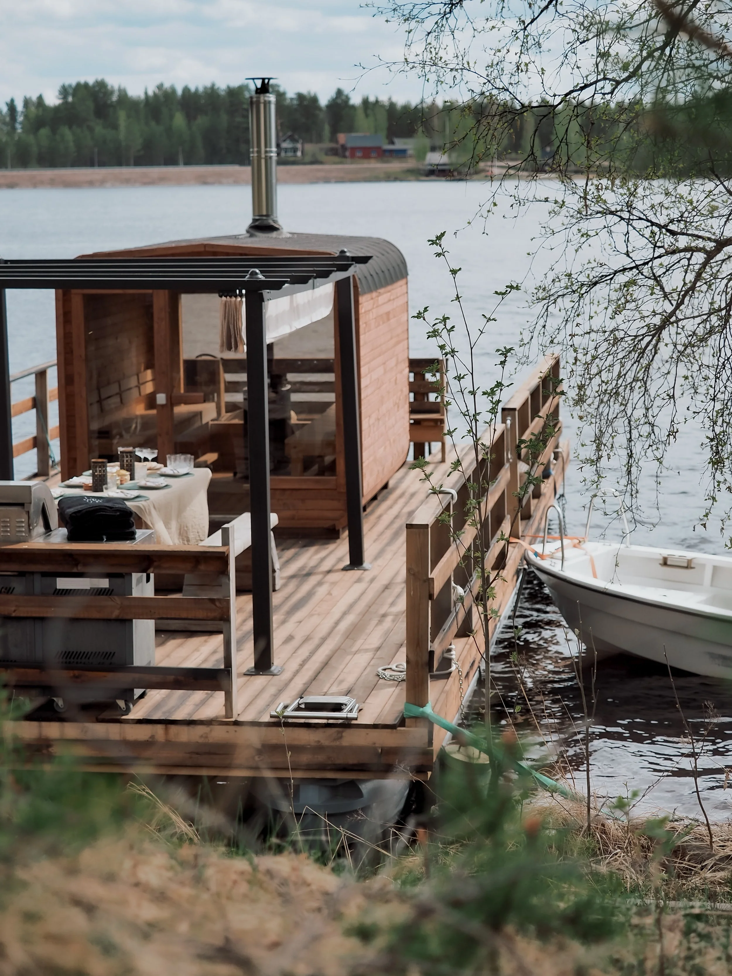 Floating raft with sauna on Oresjön lake in Furudal
