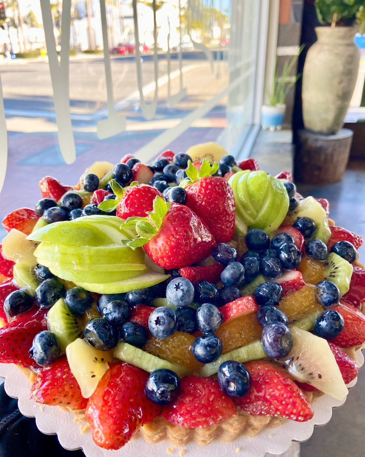This beautiful masterpiece is NOW available to pre-order for Mother&rsquo;s Day! 🌷 9&rdquo; round fruit tart, serving 8 guests.  All butter crust, handcrafted pastry cream with assorted fruit.  Trust me when we say, &ldquo;Your Mom will love this!!!