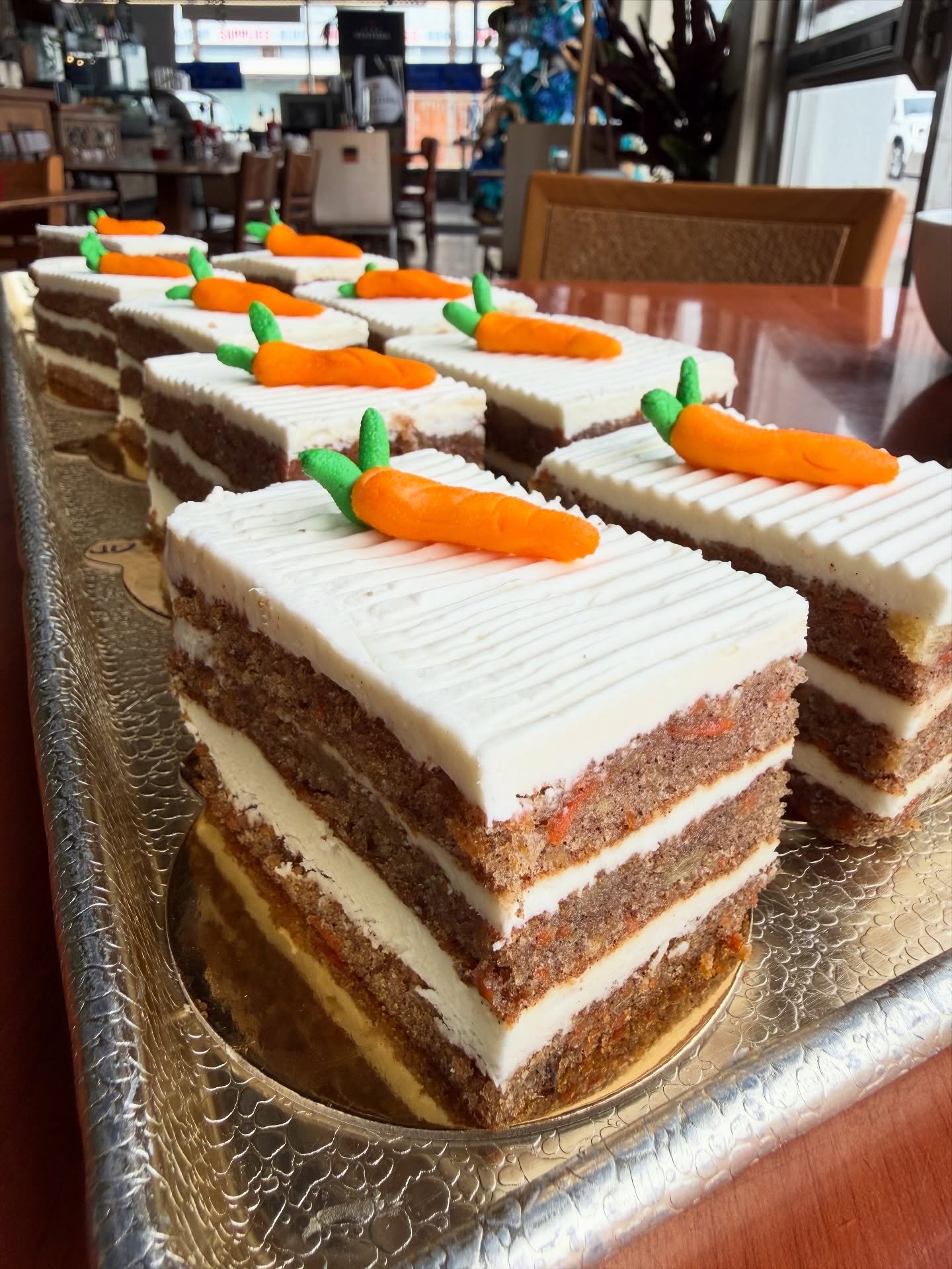 Warning: this carrot cake steals hearts 🥕💛

Rich, dense, packed with fresh carrots, pineapple, cozy spices, and smothered in sweet cream cheese filling &amp; frosting 😍

One bite and you&rsquo;ll know why it&rsquo;s one of our BEST desserts!

Made