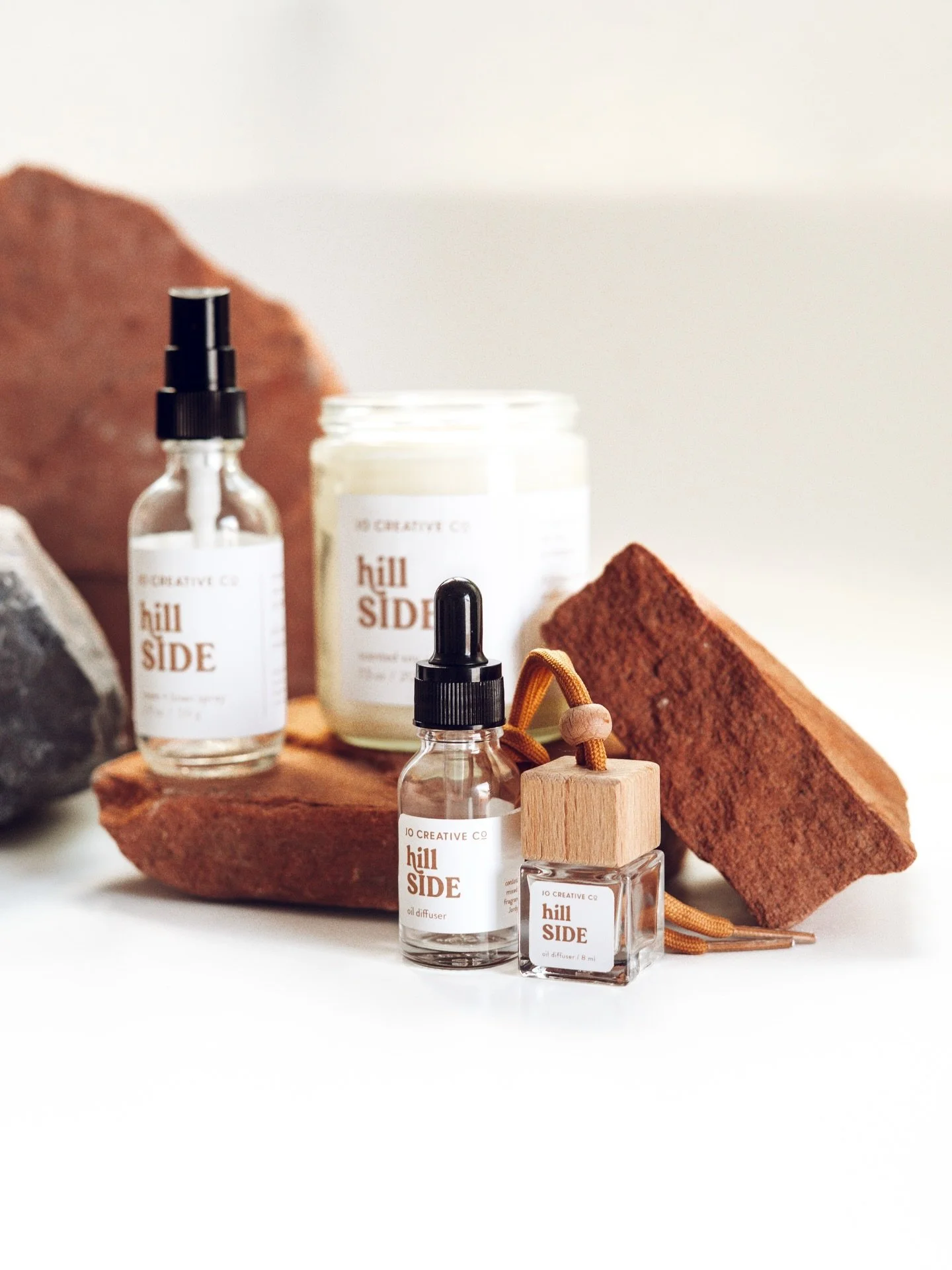 Hillside captures a beautiful, picturesque moment of the early morning light shining on the hill. This warm, peaceful scent create a waking moment of fresh orange blossom, sea salt, and soft sandalwood.

When I get a sense of warm citrus in a fragran