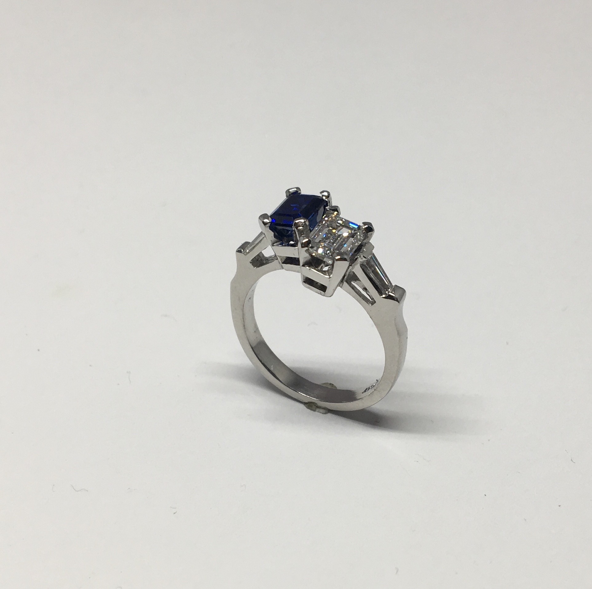 Diamond & sapphire ring set in platinum
