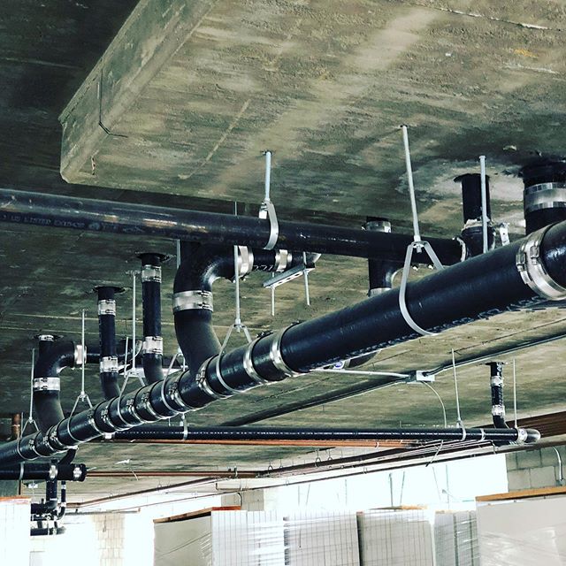14 unit apartment complex waste system. Everything graded at 2% on the dot. Water system allows for each unit to have individual shut off valves for maintenance.