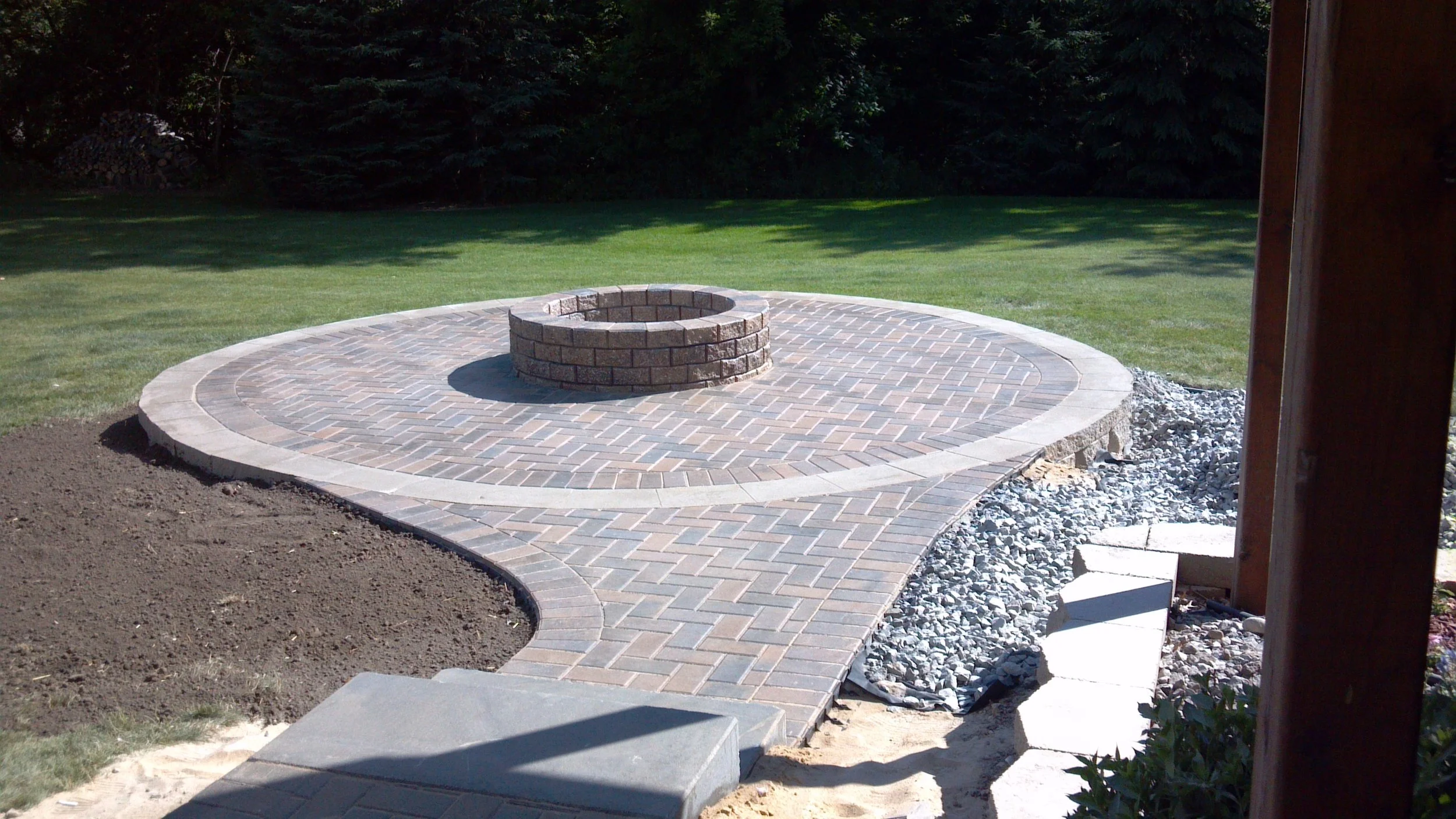 Landscaping done around your patio pavers in the fall will blossom early in the spring and have stronger root systems.
