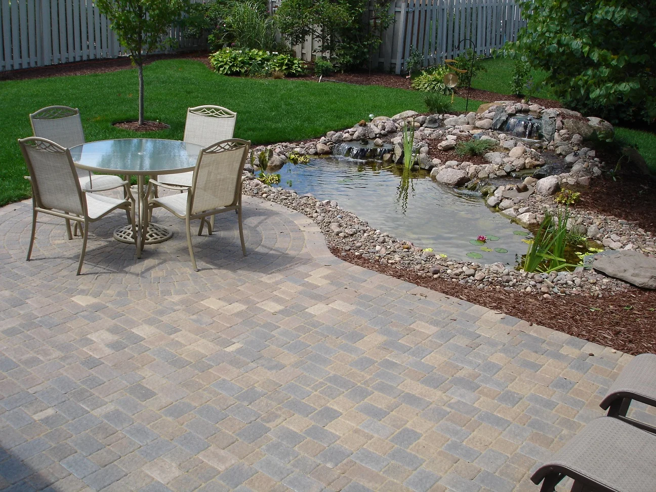 A complete landscape design can include ponds, a patio, fire pit, grading of yard and other great options for better living in Madison WI