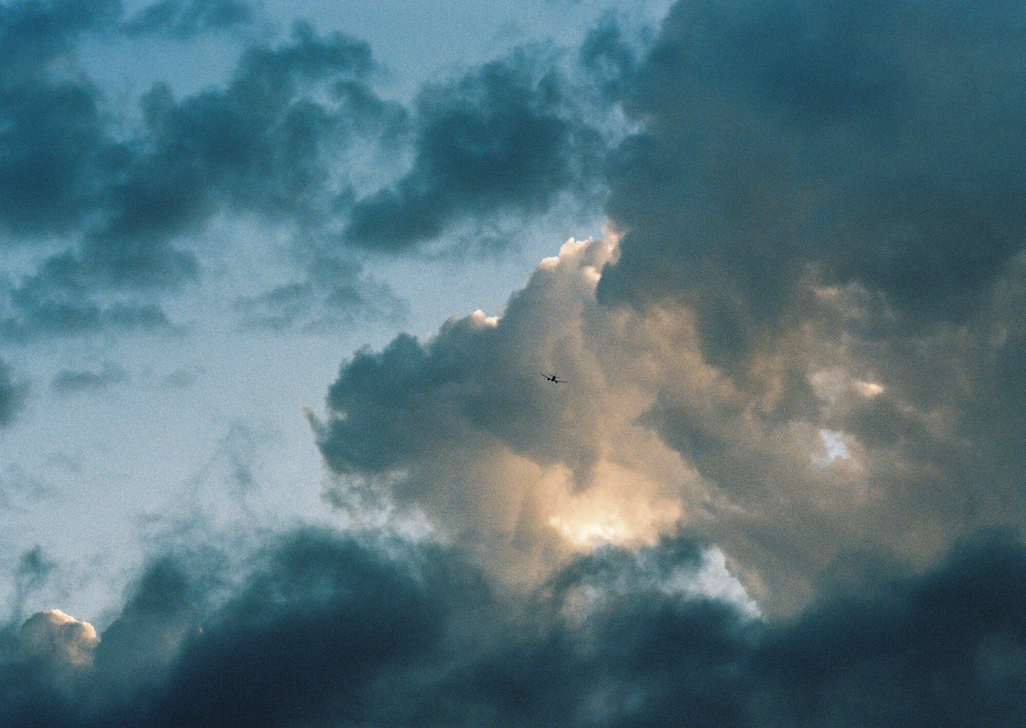 small plane in clouds.jpg