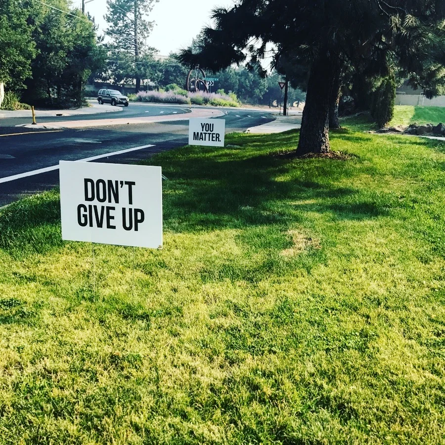Encouraging yard signs on the way out of Bend