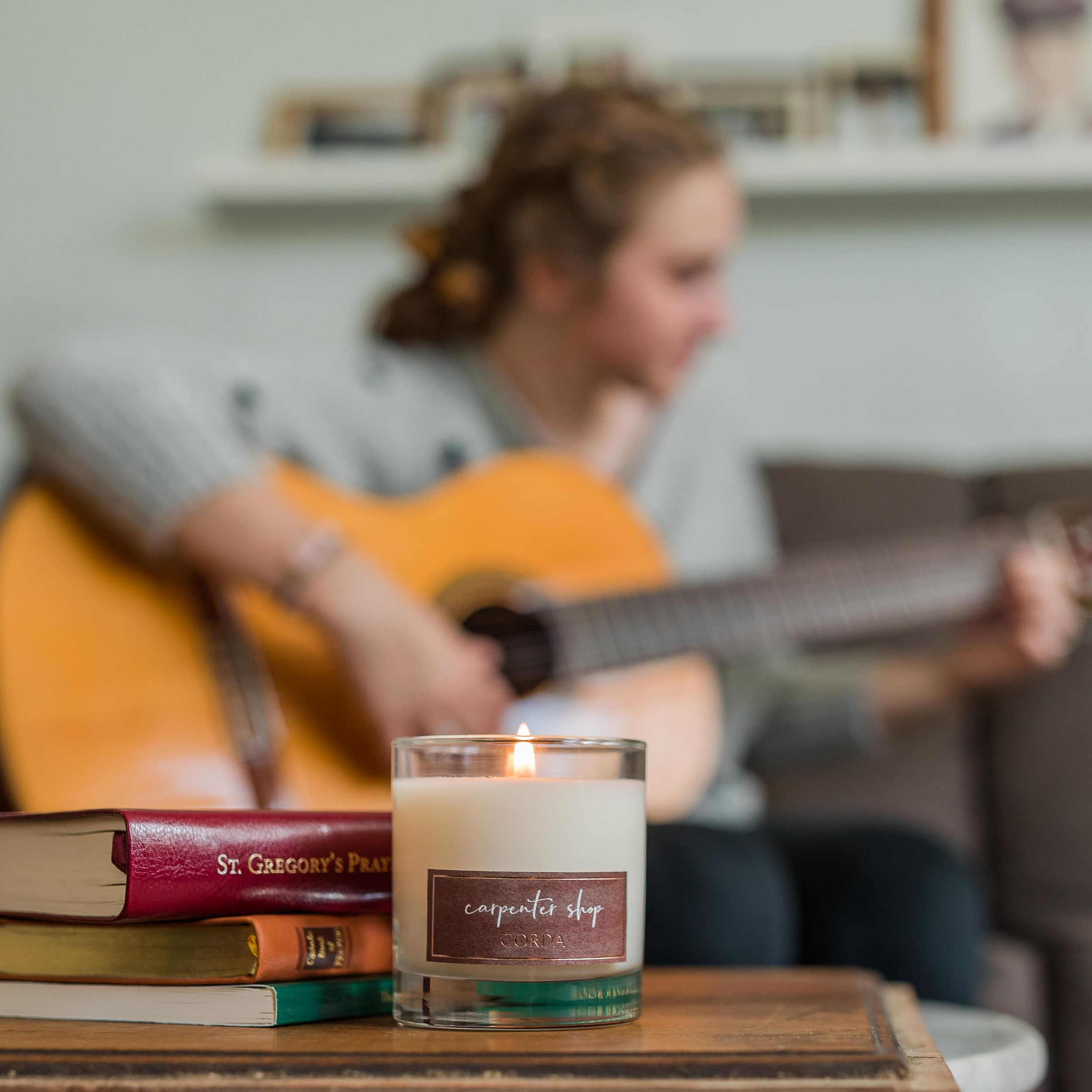 Carpenter Shop 3 (styled shot) Joseph the Worker CORDA candle.png