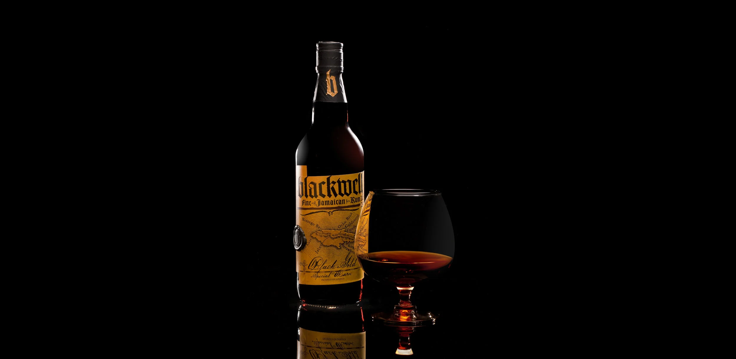 58e809c713282314b533664b_58d137736767c68d776e129d_Blackwell Rum Bottle.jpg