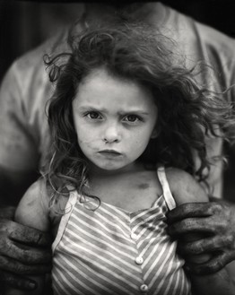 “Photographs open doors into the past, but they also allow a look into the future.”