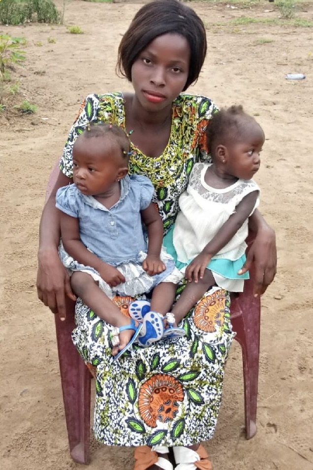 Benoit Ikuba’s sister with her twins Kinshasa, Democratic Republic of Congo, 2022