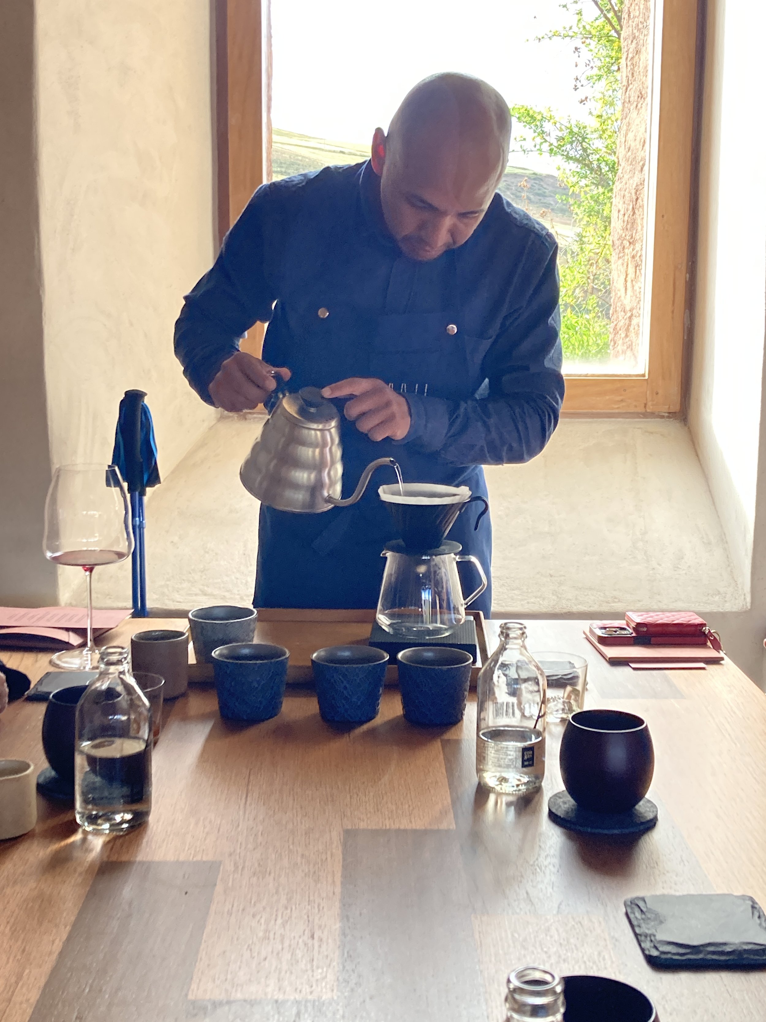 man pouring coffee