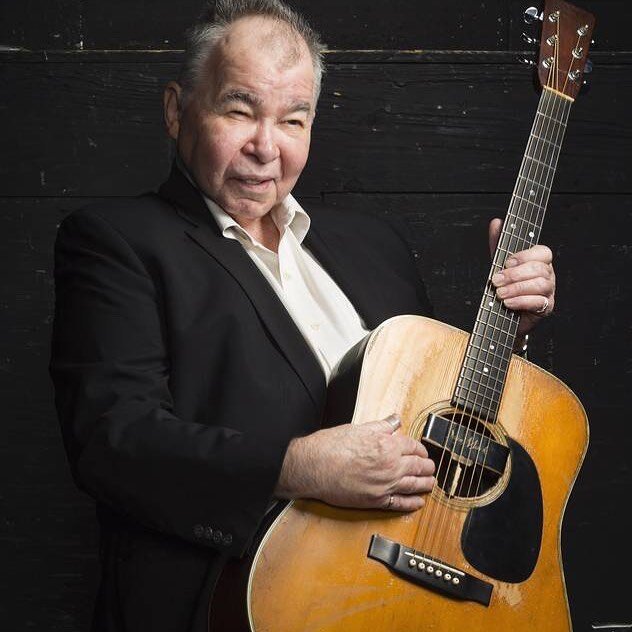 My first &ldquo;Nashville moment&rdquo; also happened to be my first John Prine moment.
I&rsquo;d just moved here, and took a job at the airport. While on a break, giving a full frontal to the urinal, I hear the drone of the intercom I&rsquo;d come t