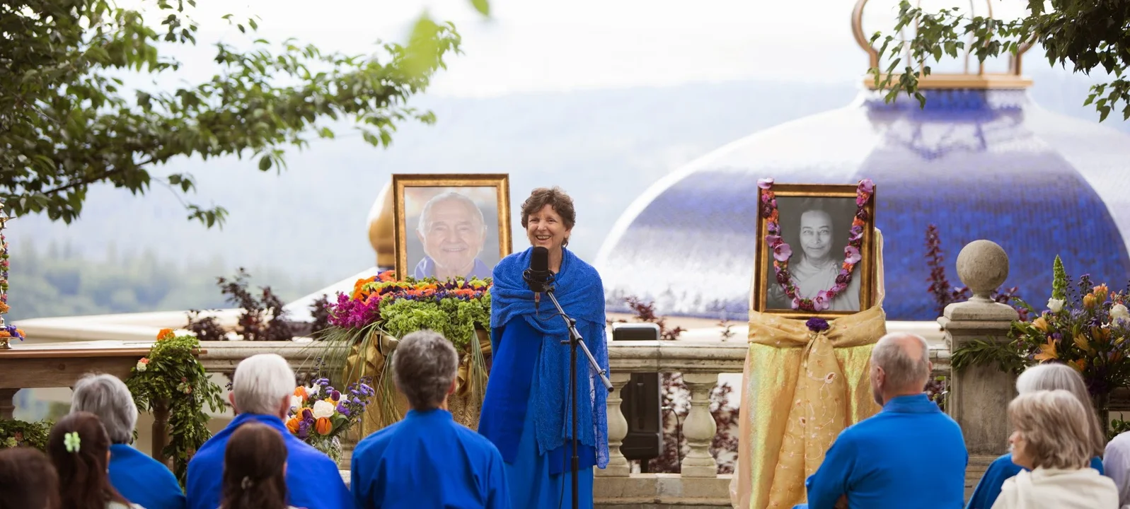 Asha at Moksha speaking.jpg