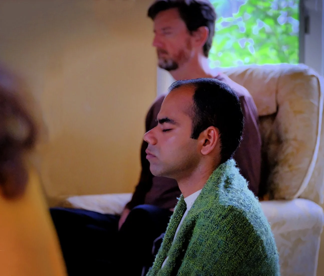 Sai and James meditating.jpg