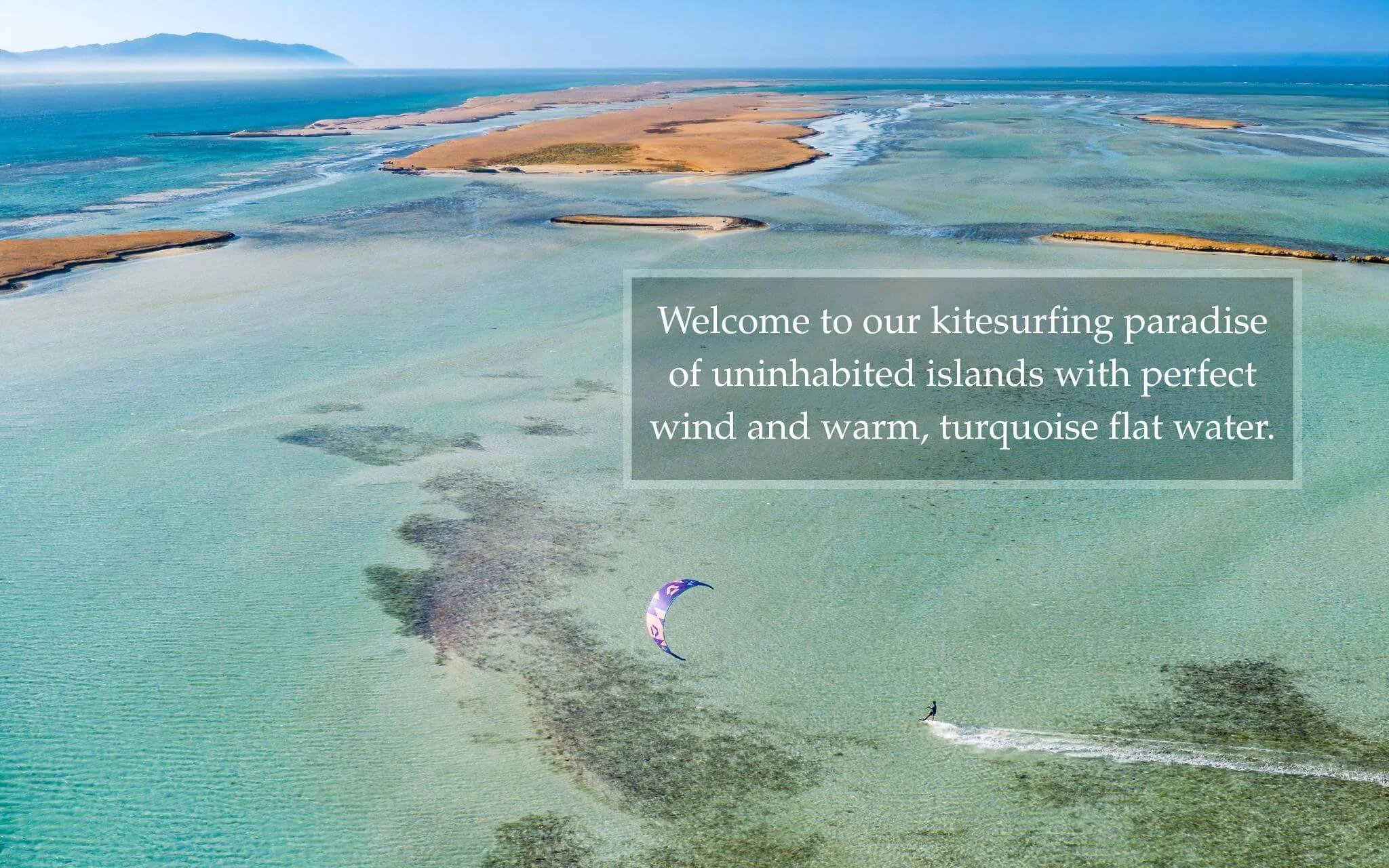 Premium luxury kite safari with kitesurfers and mega-yacht on Egypt Red Sea