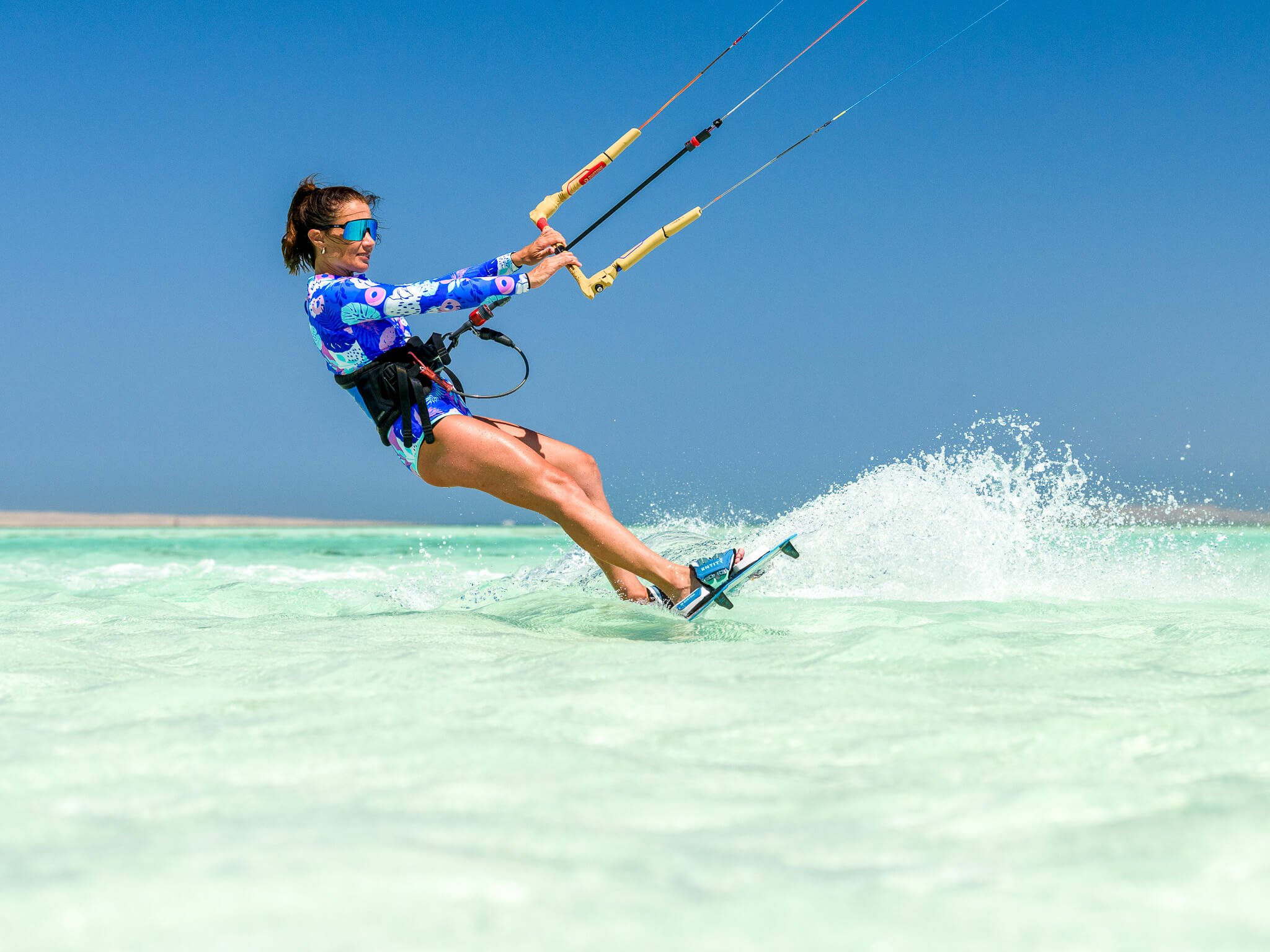 Intermediate kitesurfer enjoying the perfect flat water of Egypt's Red Sea