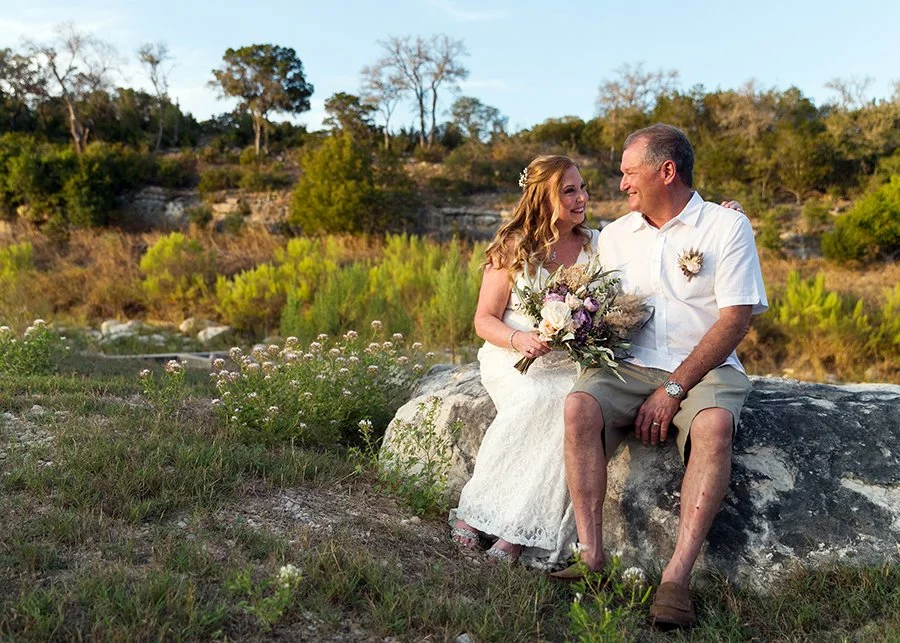 Phyllis Wedding couple on rock.jpeg