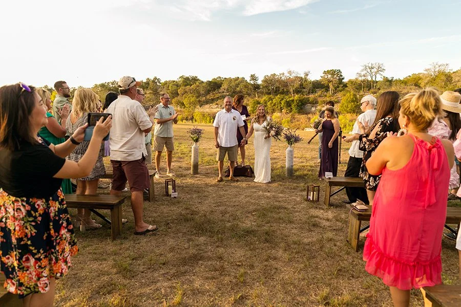 Phyllis Wedding couple at alter.jpeg