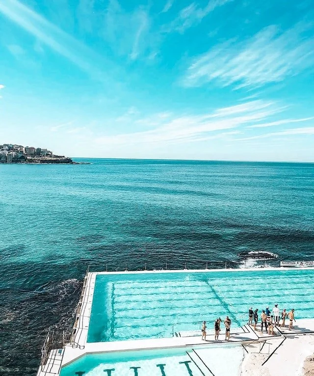 people-standing-beside-swimming-pool.jpg