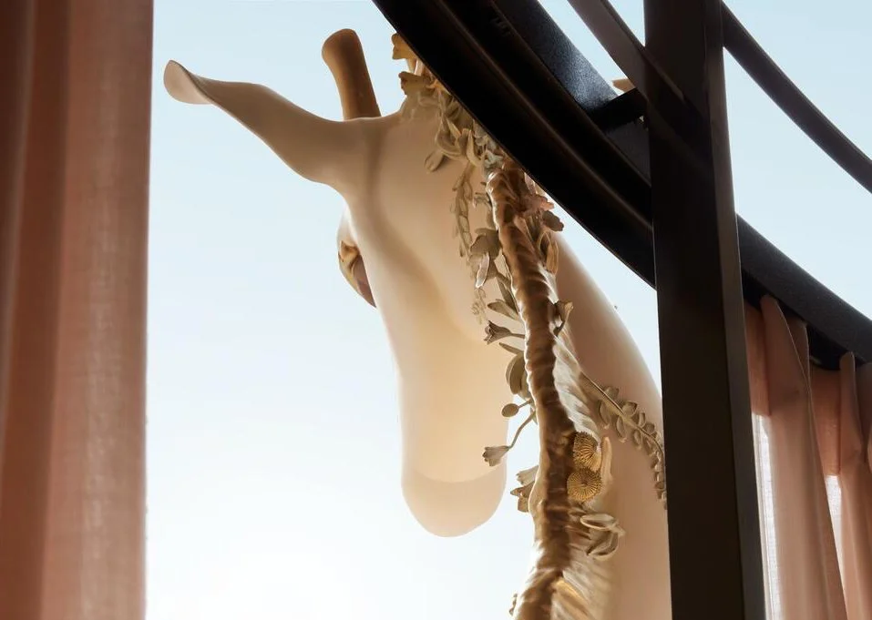  Clare designed a life-sized giraffe for Studio Shamshiri for Irene Neuwirth’s store in New York City. She imagined the beast was a goddess of creation: from deep inside her pure heart sprouted flowers, birds, vines, snails, butterflies, four-leaf cl