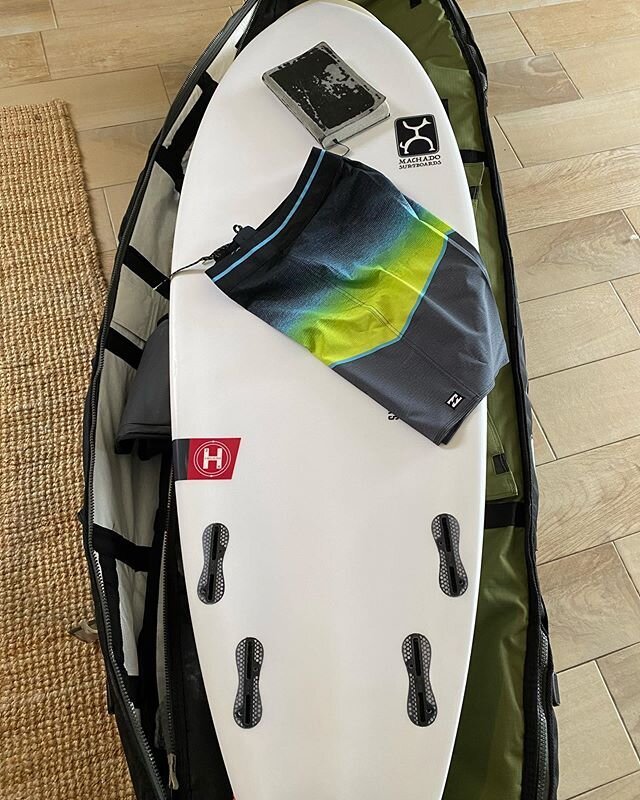Board, Bible, board-shorts....the necessities of a surf trip. Heading south!