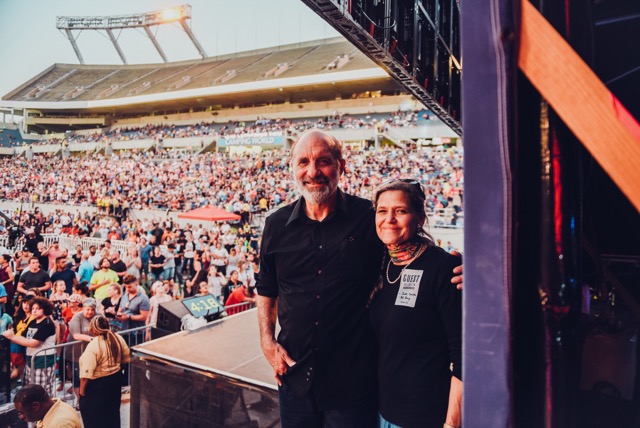 Photo of Lou and Therese Engle at The Send. We later noticed the stage clock in the background.