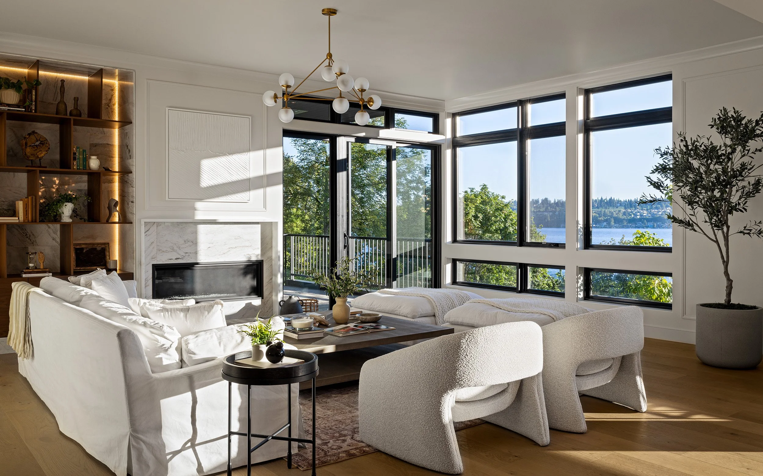 Bright residential living room interior with lake views in Kirkland, WA, Seattle interior photography by Mike Arty