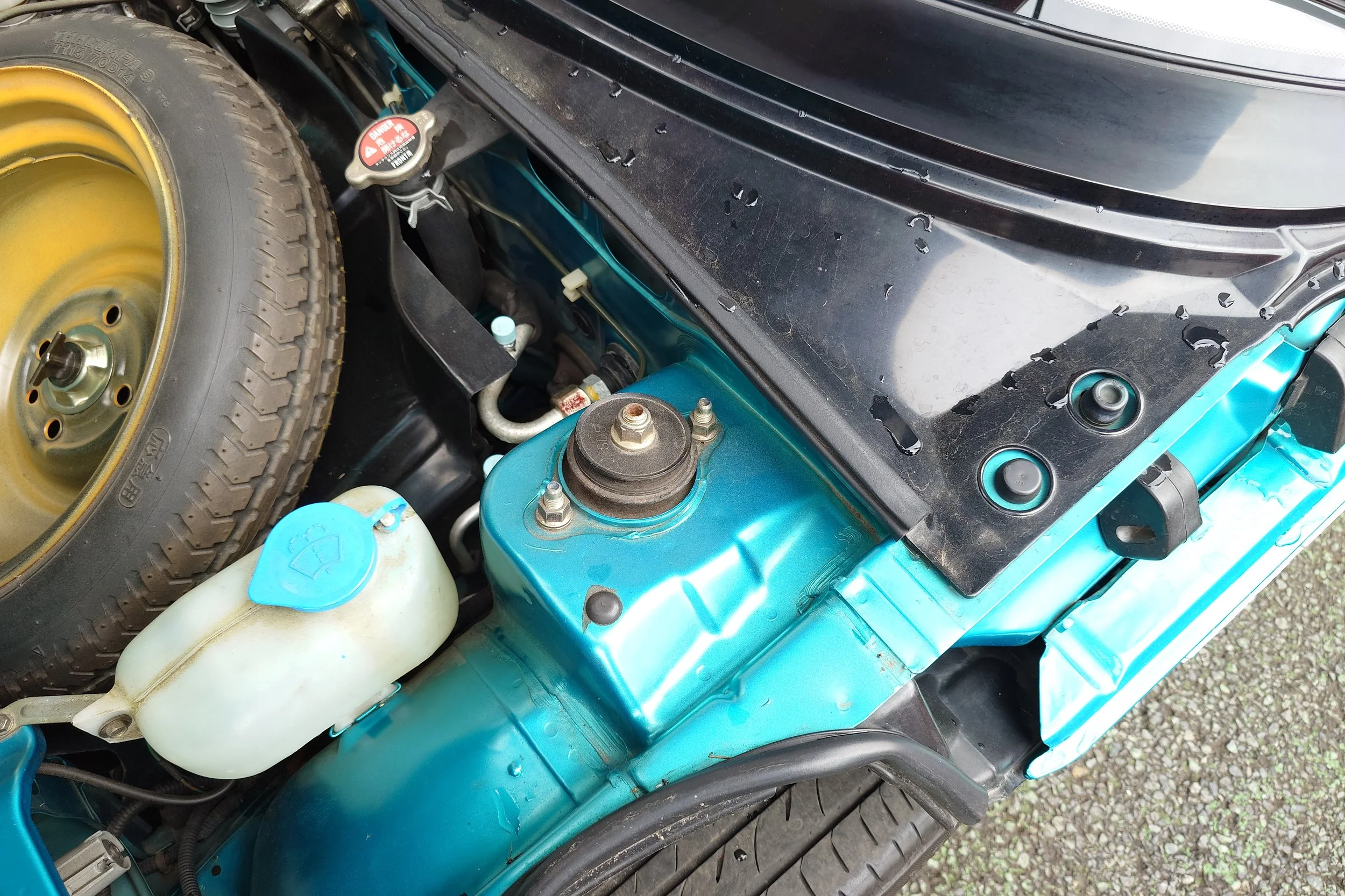 the inspector looks for signs of structural panel replacement, extra welds, non factory sealers, rust or coverups. 