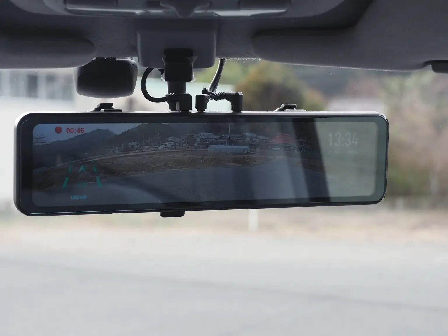 Interior shot of aftermarket digital rear vision mirror, driver recorder and reverse camera upgrade installed on 2001 Toyota Estima Aeras L Japan export inventory for sale