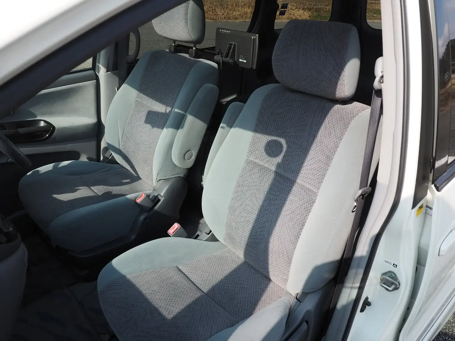 Interior shot grey front passengers seat 2001 Toyota Estima Aeras L Japan export inventory for sale