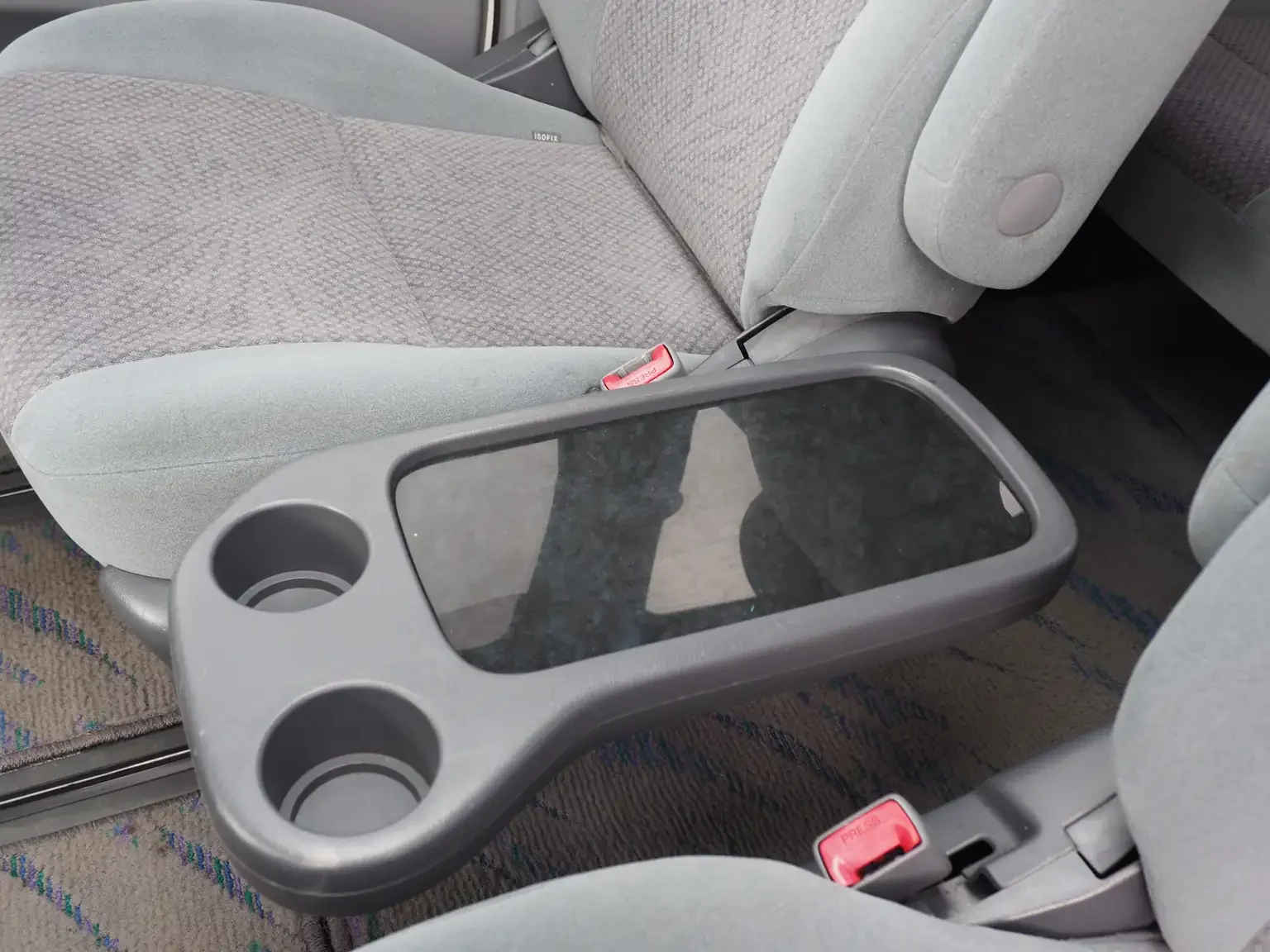 Interior shot of 2nd row walk through seats with tray table in use 2001 Toyota Estima Aeras L Japan export inventory for sale