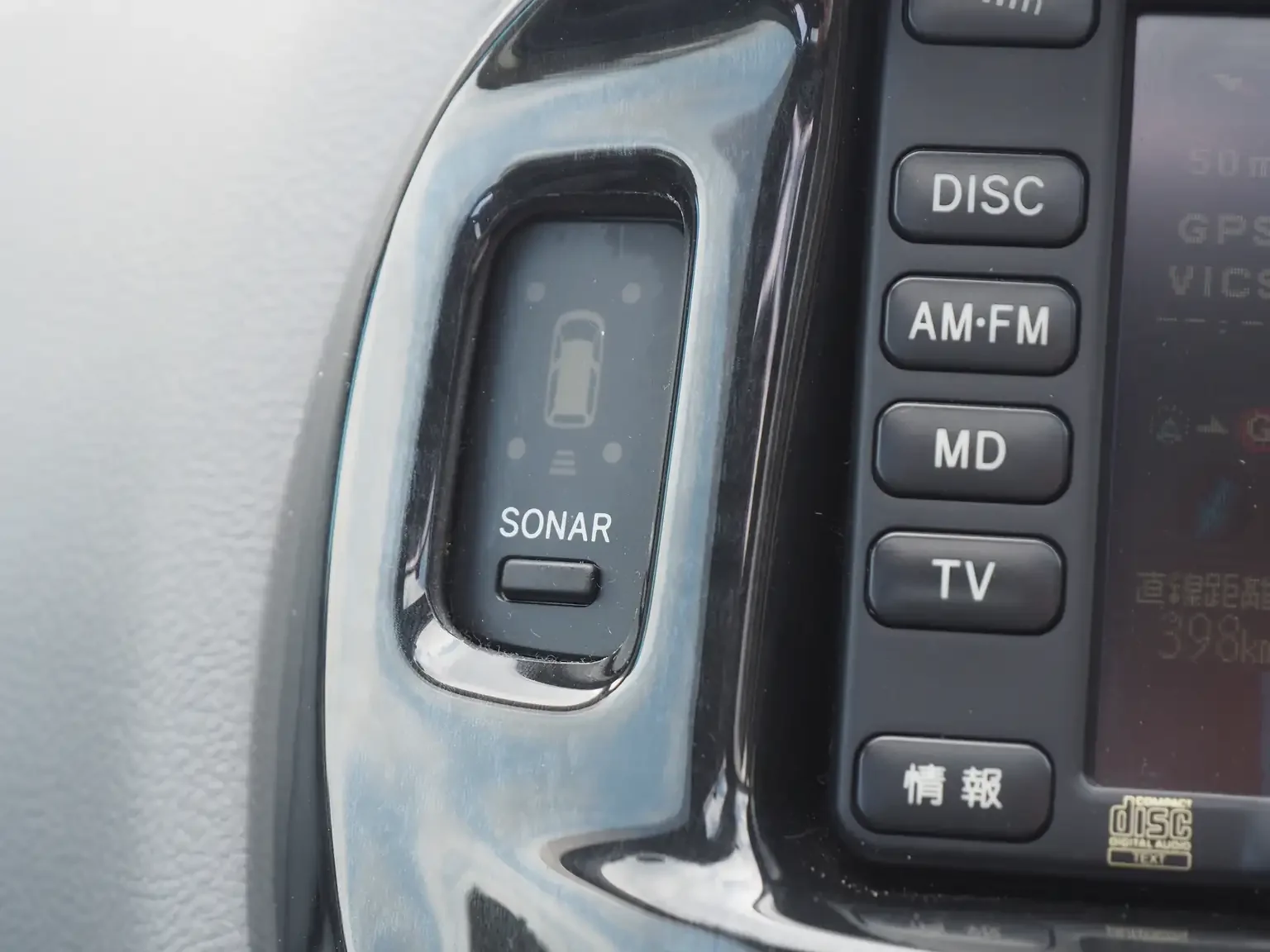 Interior shot of factory option parking sensor control panel 2001 Toyota Estima Aeras L JDM export inventory for sale in Kobe