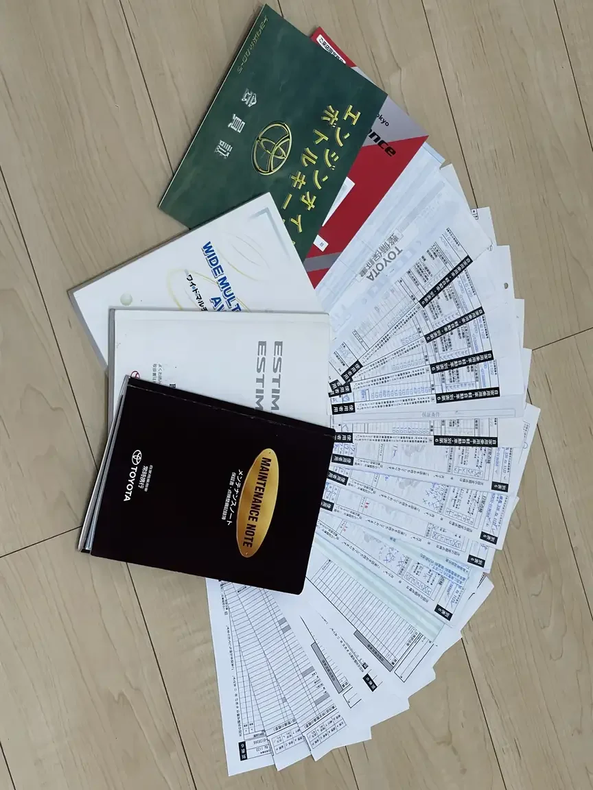 Full service history records laid out 2001 Toyota Estima Aeras L Japan export inventory for sale