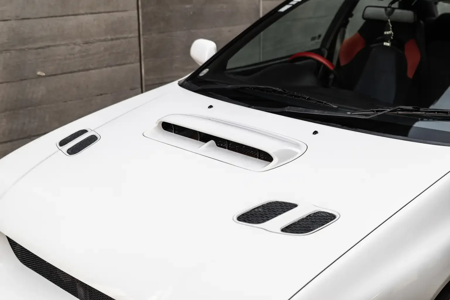 white bonnet showing vents and intercooler intake scoop on gc8 subaru impreza WRX STi version 4 1998 JDM vehicle for export sale New Zealand