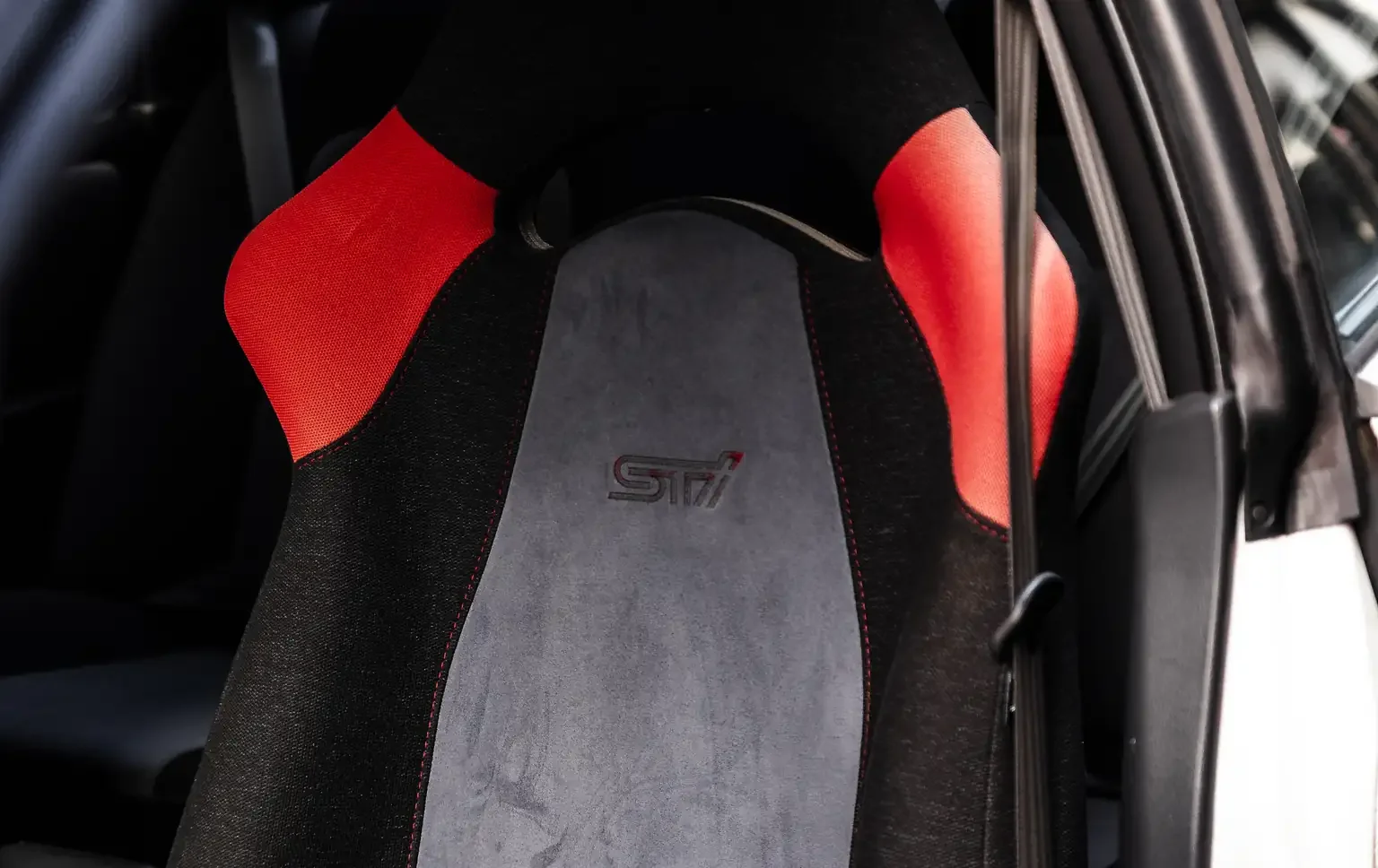 front passengers seat red black and grey subaru impreza WRX STi version 4 1998 JDM vehicle for export sale New Zealand