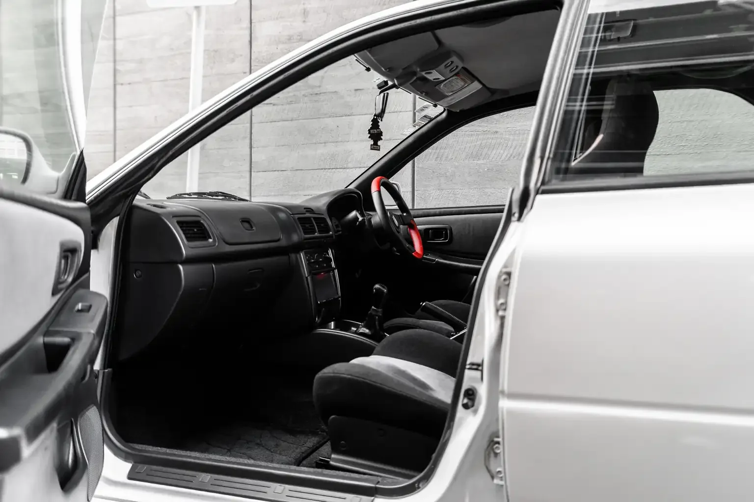 passengers front door open revealing interior gc8 subaru impreza WRX STi version 4 1998 JDM vehicle for export sale New Zealand