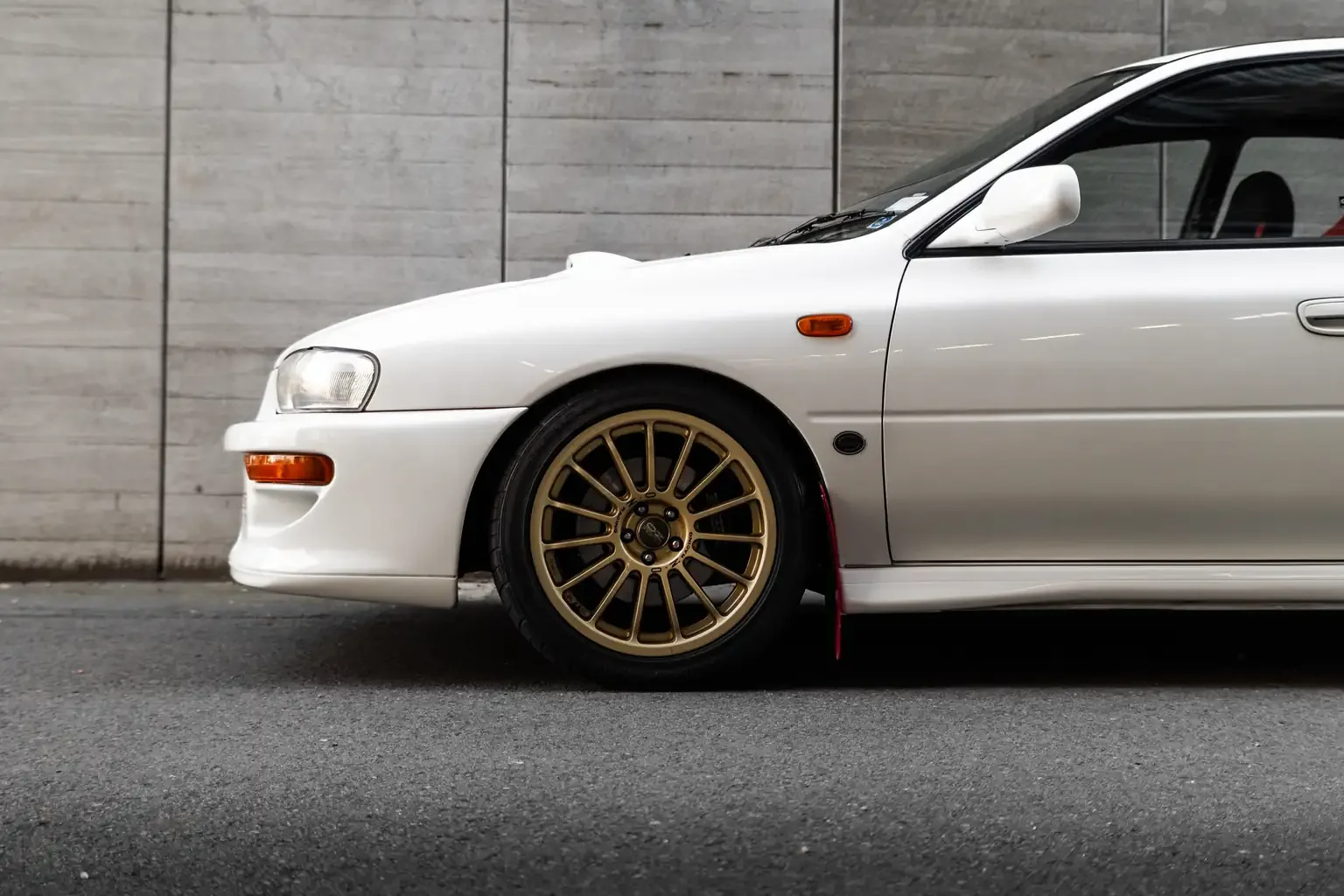 side shot front half white gc8 subaru impreza WRX STi version 4 1998 JDM vehicle for export sale New Zealand
