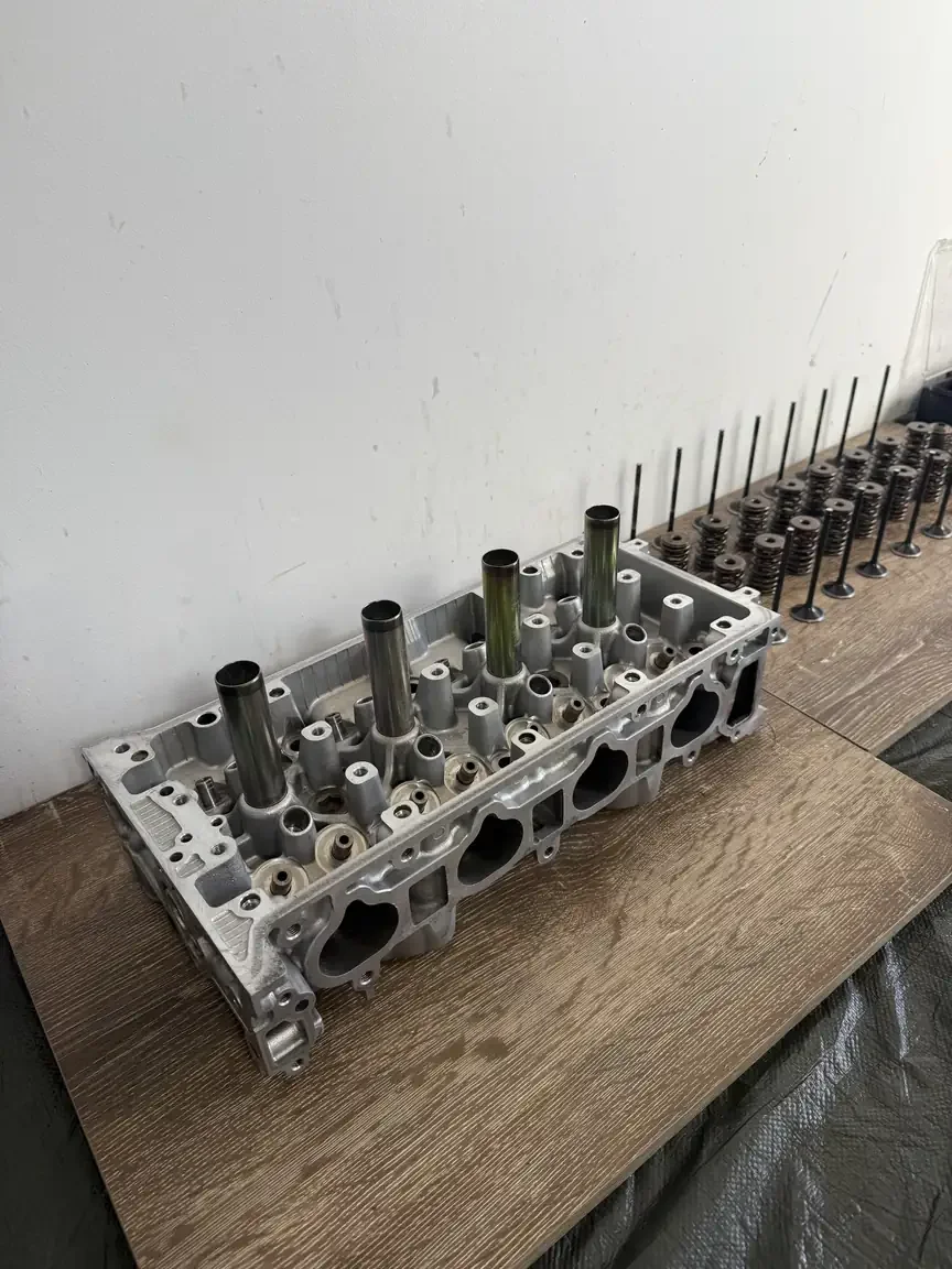 K20A engine cylinder head being rebuilt 2001 DC5 Honda Integra Type R JDM export vehicle for sale New Zealand