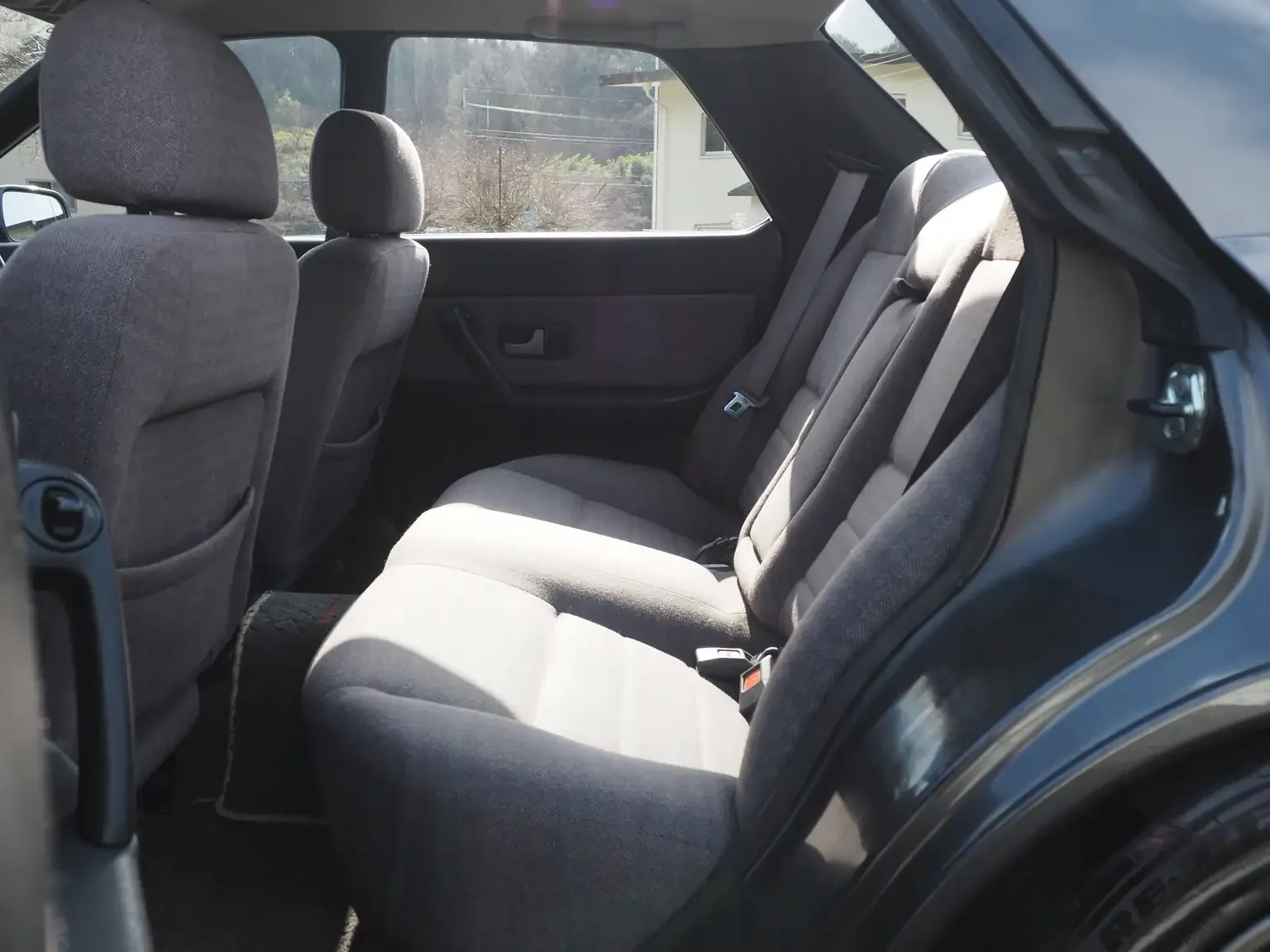 Interior passengers side view of rear grey cloth type x g seats 1991 Nissan Skyline GTS25 Type X G 4 Door Sedan for export from Japan