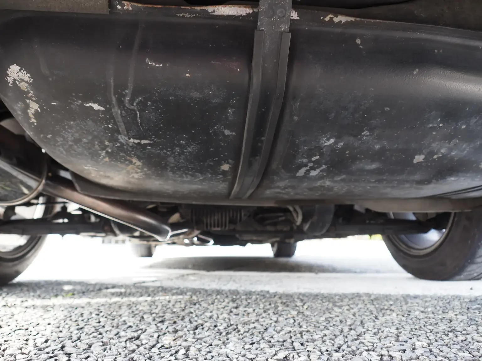 Undercarriage view showing undamaged and rust free chassis 1991 Nissan Skyline GTS25 Type X G 4 Door Sedan for export from Japan