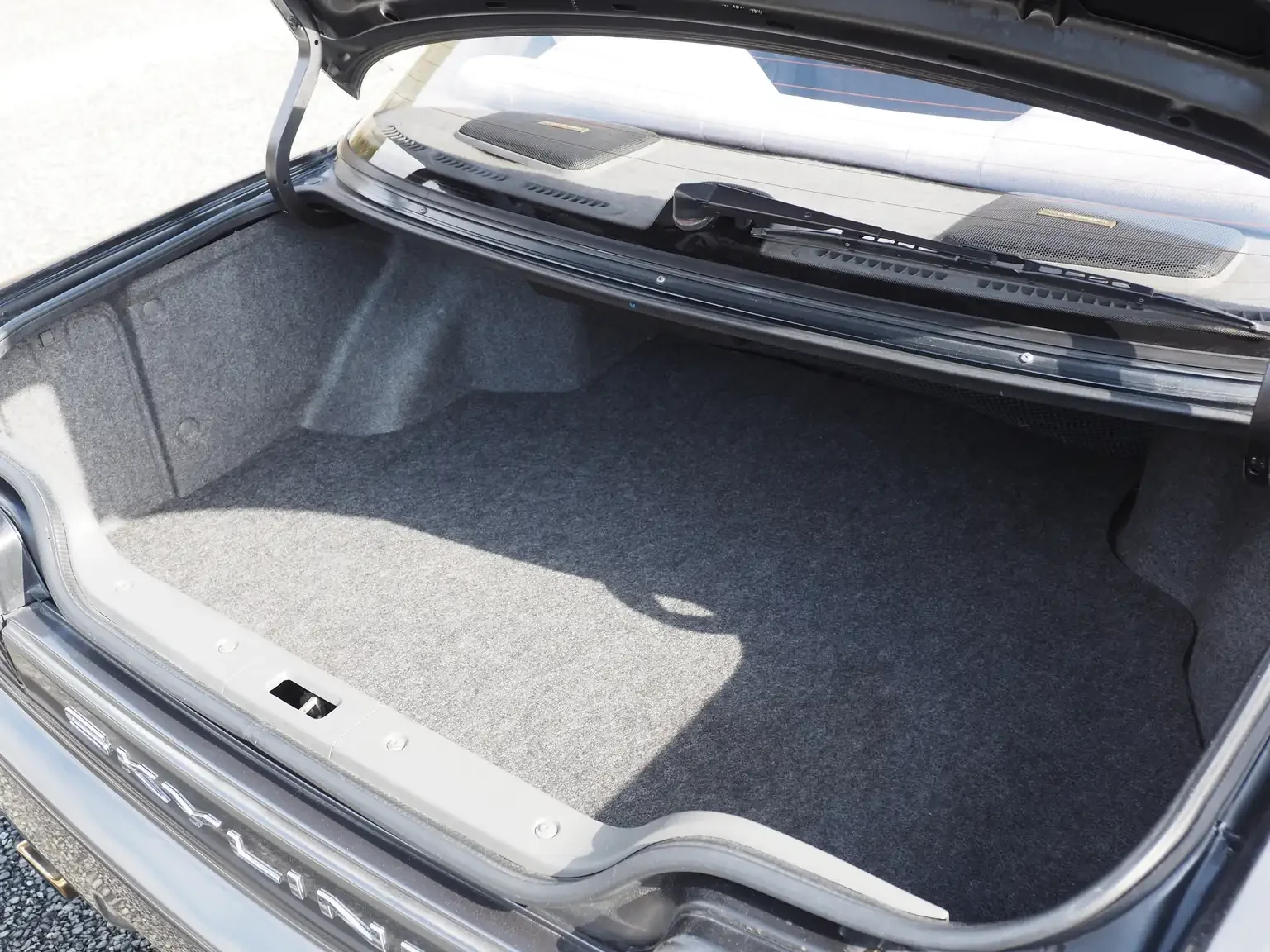 Interior view of trunk room 1991 Nissan Skyline GTS25 Type X G 4 Door Sedan for export from Japan