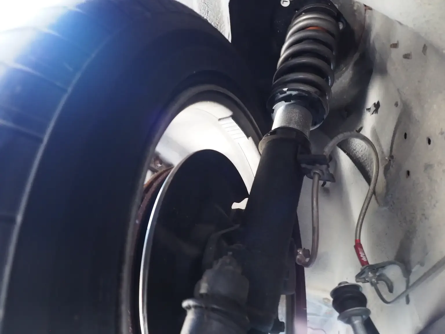 undercarriage view showing adjustable suspension Nissan fairlady z 200zr 2 seater JDM for export from Japan